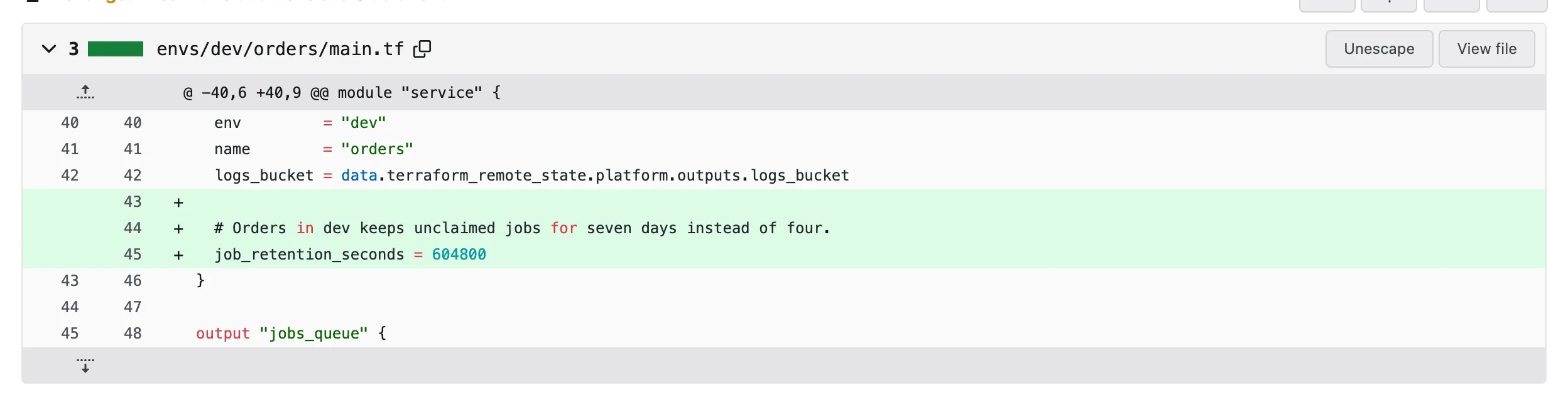The pull request's files tab, adding job_retention_seconds = 604800 to dev orders
